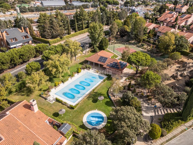 Foto 3e0b021b-956c-4ca4-9335-09de138fee9b. Doppelhaus mit heizung parking pool in Las Marías Torrelodones