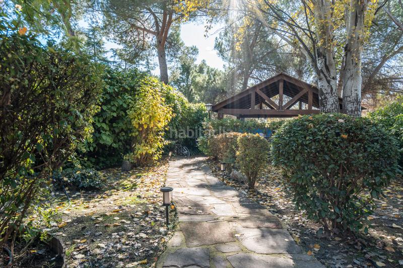 Foto 4c472165-8746-41b7-af1c-ff9c6a2d464e. Casa adossada amb xemeneia calefacció aparcament piscina a Galapagar