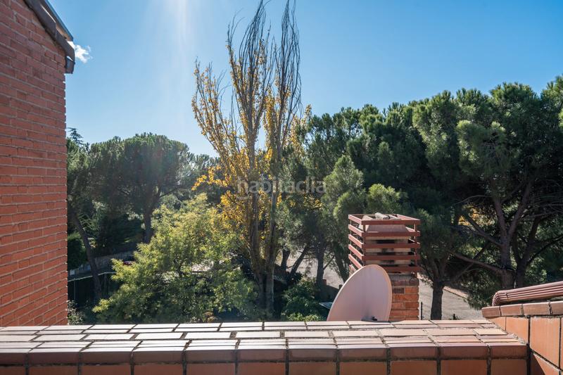 Foto 57c74cae-f39a-419b-9703-7e7b3d41d45f. Casa adossada amb xemeneia calefacció aparcament piscina a Galapagar