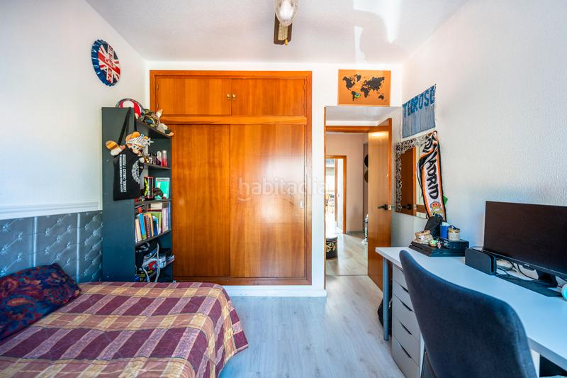 Foto c4e82bbf-d811-4955-be59-c59404c5a4e8. Casa adossada amb xemeneia calefacció aparcament piscina a Galapagar