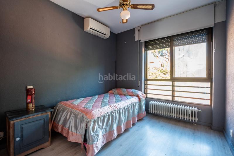 Foto f1ee4b3d-0285-47c6-b5a5-d498fe8143c8. Casa adossada amb xemeneia calefacció aparcament piscina a Galapagar