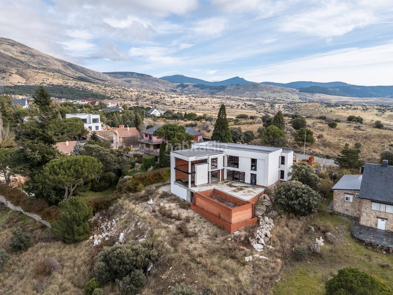 Foto 901d685b-b3e0-4a47-b69a-2ab949636fe4. Chalet with fireplace heating parking pool in Los Ángeles de San Rafael Espinar (El)