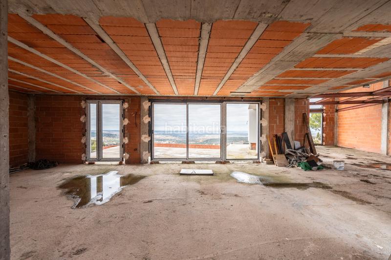 Foto d52f69d5-ca9e-412b-994c-1929261ffb70. Chalet with fireplace heating parking pool in Los Ángeles de San Rafael Espinar (El)