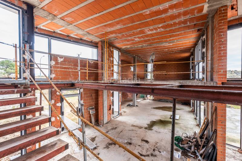 Foto fa932cee-f16b-4ae7-b98b-a974aac84381. Chalet with fireplace heating parking pool in Los Ángeles de San Rafael Espinar (El)