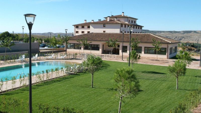 Foto c1581243-f684-41c7-afe4-533c61520f0e. Edifici amb piscina a Villarrubia de Santiago