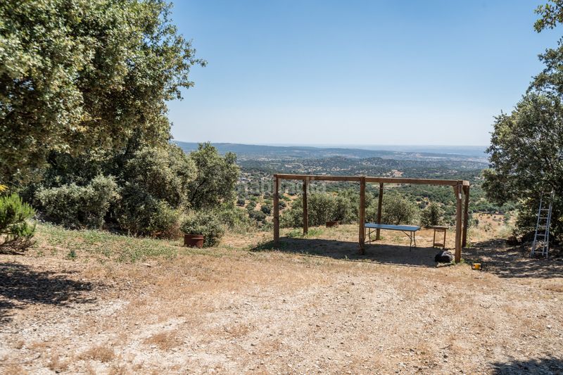 Foto d64983c3-14ac-4448-bc2a-e9d8fd72e767. Masia amb xemeneia calefacció a Cenicientos