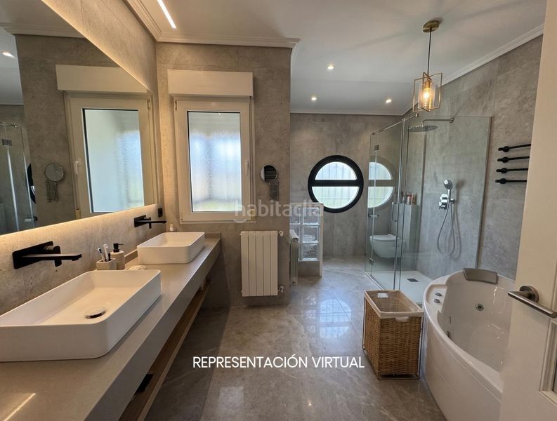 Foto 4f05cd9e-7485-4f92-be8d-af79d51dcfe9. Casa adossada amb xemeneia calefacció aparcament piscina a Galapagar