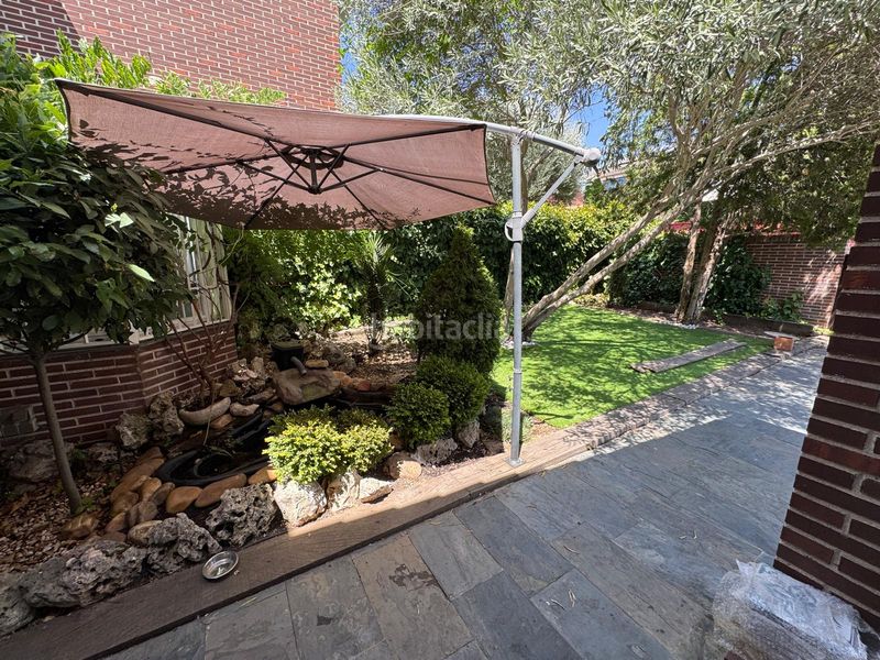 Foto b3b63356-6c29-493d-af63-7084d6ac4a6a. Casa adossada amb xemeneia calefacció aparcament piscina a Galapagar