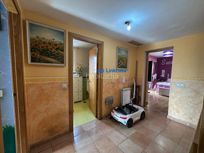 Foto 0c4e1f96-4f8f-40fc-ae56-5609d53cd4de. Casa adossada amb calefacció aparcament piscina a Fuenlabrada