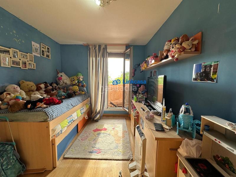Foto bce6e518-d47c-4229-960f-3cc363a776a3. Casa adossada amb calefacció aparcament piscina a Fuenlabrada