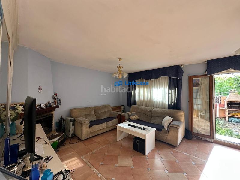 Foto d88d4473-538a-4438-bf31-feb86733eb0c. Casa adossada amb calefacció aparcament piscina a Fuenlabrada