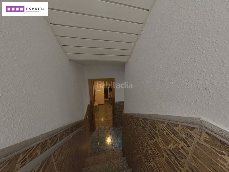 Foto 4ca29e23-1a96-466b-b385-76ac5e45da2a. Casa amb xemeneia calefacció a Casc Antic Ripollet