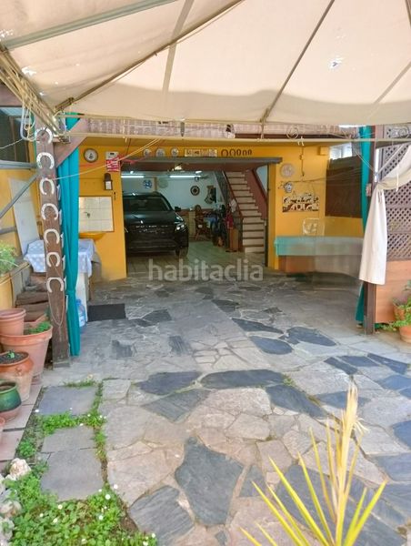 Foto c138b22e-f6c5-4c01-bbe2-0bdc6de98ec1. Casa adossada amb xemeneia calefacció aparcament a Ripollet