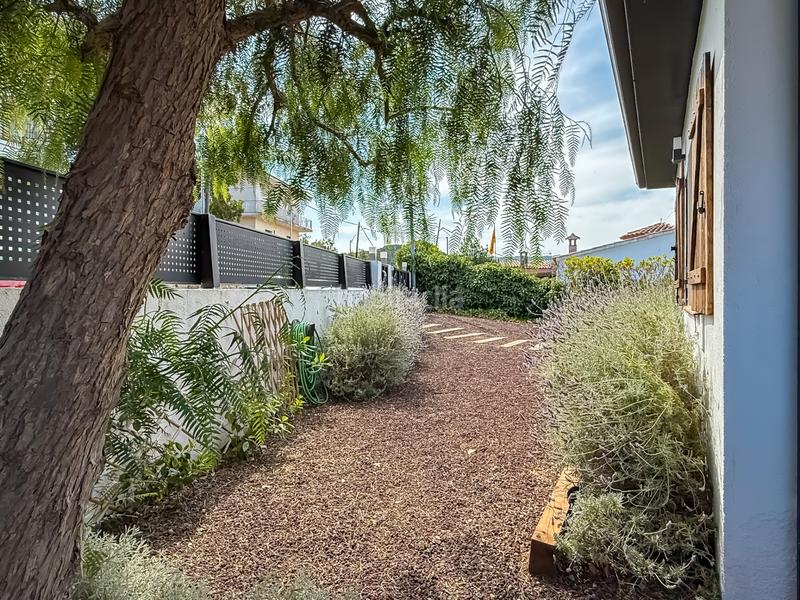 Foto d33dfc60-059d-4652-ac7f-86c4cd177ef4. Chalet with fireplace heating parking pool in Mas Pere-Río de Oro Calonge