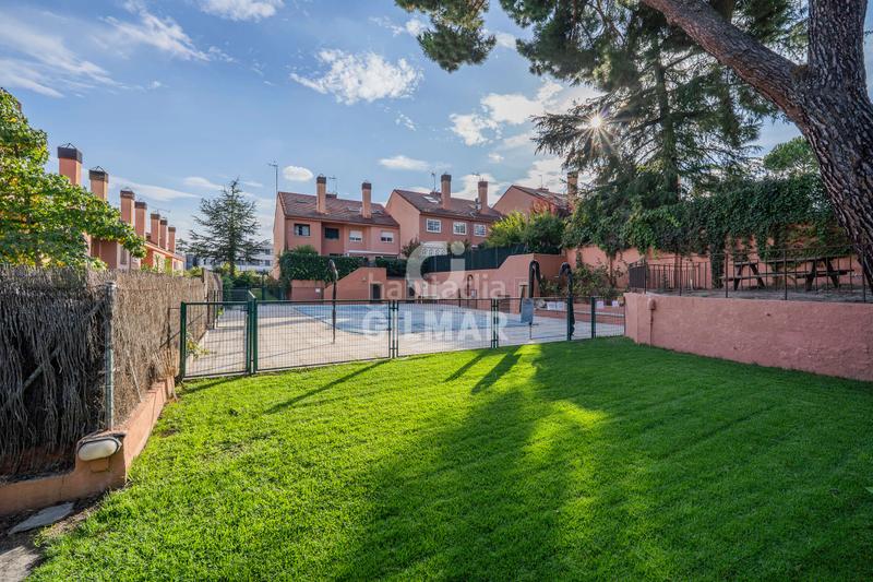 Foto 6d1a698b-5d43-43ae-a7f4-a2701a81783d. Casa adossada amb calefacció aparcament piscina a Pozuelo de Alarcón