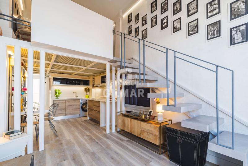 Foto 1ad6e0b1-d688-451f-a5e6-f253fc29d130. Dúplex descubre este exclusivo apartamento dúplex de obra nueva ubicado en el vibrante barrio de San Diego, en el distrito de puente de v en Madrid