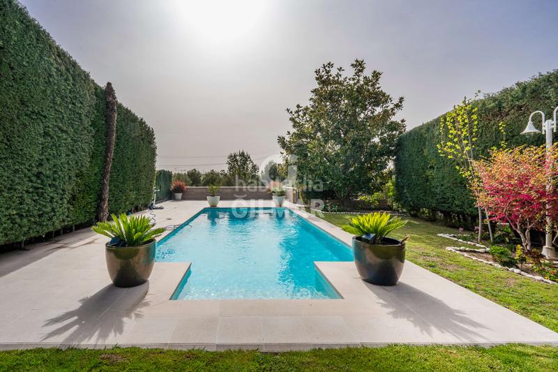 Foto 4c47e17f-b1fc-4fa5-a9f4-55999816b31e. Casa a schiera con riscaldamento parcheggio piscina in Madrid