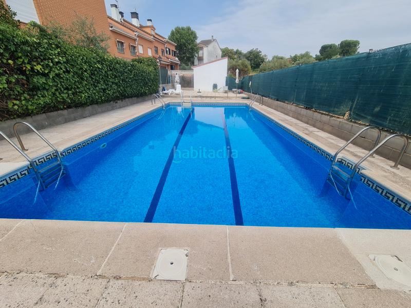 Foto f8ee09bc-3466-4902-a25e-93080292cf2e. Casa adosada en San Martín de Valdeiglesias