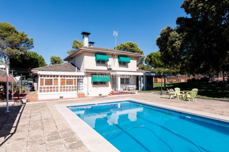 Foto ac5db762-64b4-4621-a063-3a0b2f91a364. Xalet amb xemeneia calefacció aparcament piscina a Villaviciosa de Odón