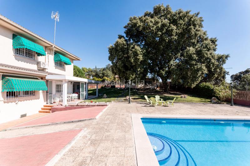 Foto fd407a26-e976-48cd-bd08-46431e30af99. Xalet amb xemeneia calefacció aparcament piscina a Villaviciosa de Odón