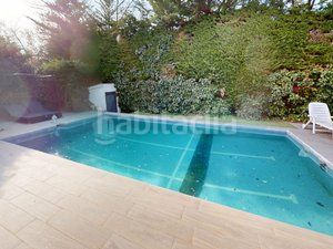Foto ed8ed30c-208a-479c-8761-80af4a11d5dd. Casa con parcheggio piscina in La Canaleja Galapagar