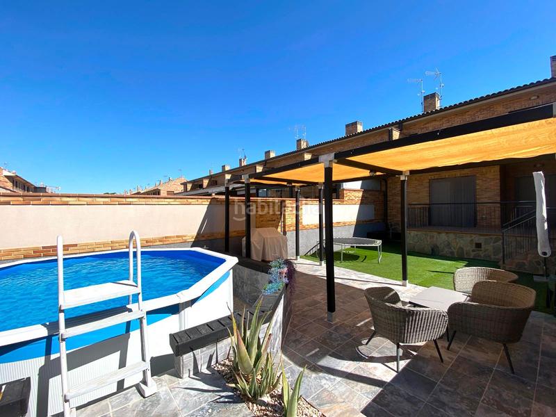 Foto e6845332-1bb2-48af-a7ef-03b9ca313e55. Reihenhaus mit parking pool in Torrejón de la Calzada