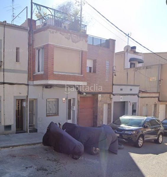 Foto 5a56c98c-e11f-49ab-9f8c-ba692e096313. Casa adossada a Barri del Centre Terrassa