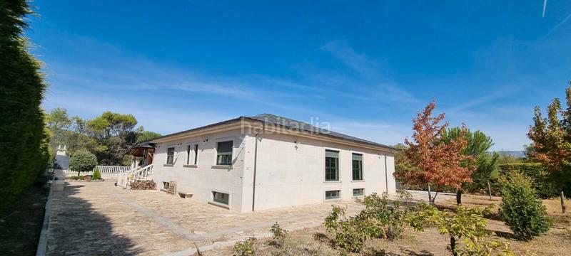 Foto 10e1544d-c213-4dc9-8544-f530d9b7095e. Chalet con camino riscaldamento parcheggio in Polideportivo-Colonia Moralzarzal