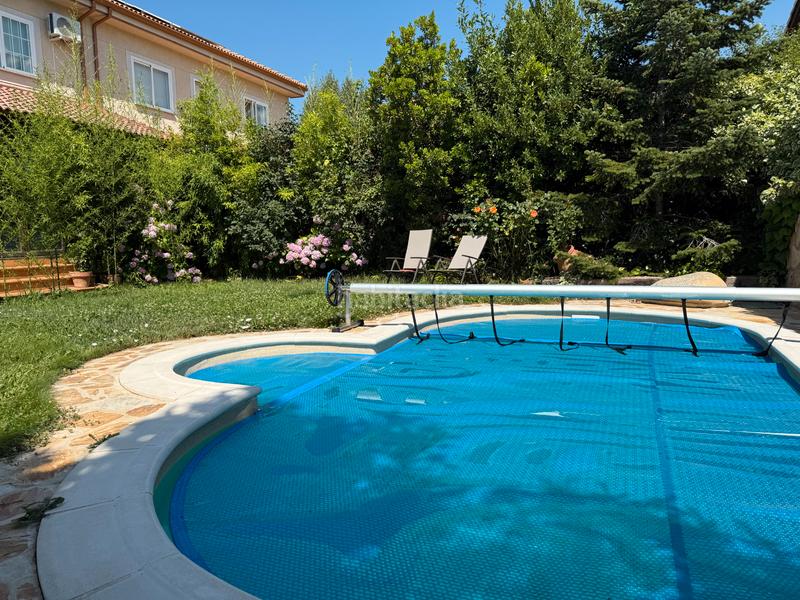 Foto 27636cb7-1bf3-44e3-b318-3f0b890080ce. Chalet avec cheminée chauffage parking piscine dans Moralzarzal