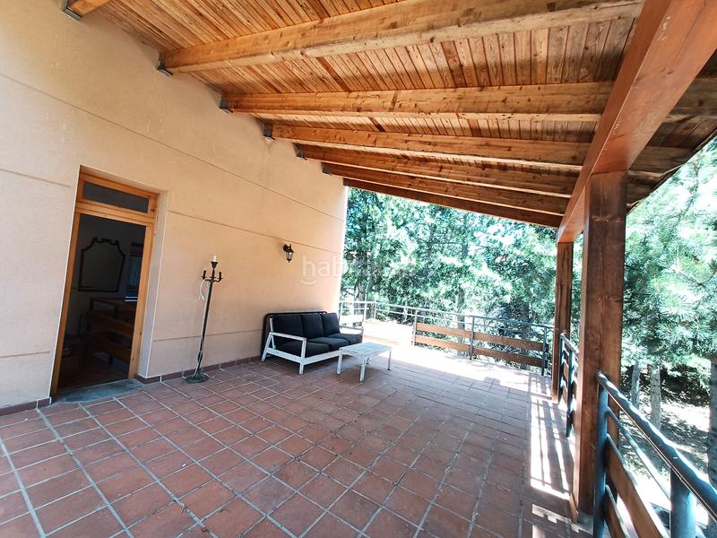 Foto 2d849c72-8b47-4285-9fa9-f6453e5fc9d7. Chalet with fireplace heating in Mataelpino