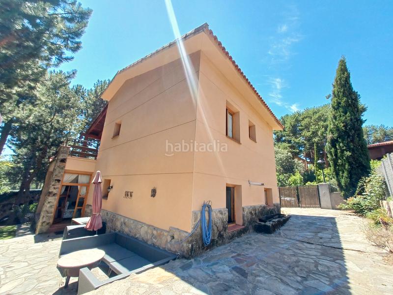 Foto 6e71d082-bf9a-47d2-b37a-217ce1ff1f88. Chalet with fireplace heating in Mataelpino