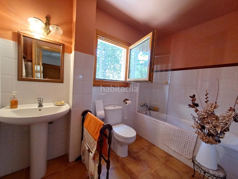 Foto 6eb12533-0ccc-4833-b425-373a2daf72b3. Chalet with fireplace heating in Mataelpino