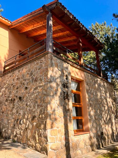 Foto 8cc5464d-973d-4f4a-9fc2-93973f41096e. Chalet with fireplace heating in Mataelpino