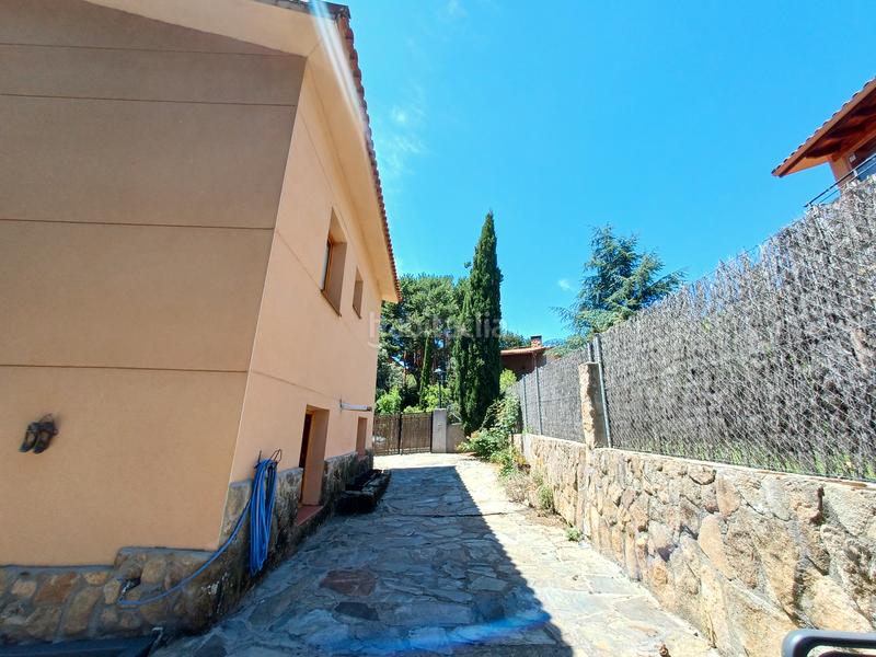 Foto 08bf5052-6b07-4ad8-8f13-320006d760f4. Chalet avec cheminée chauffage dans Mataelpino