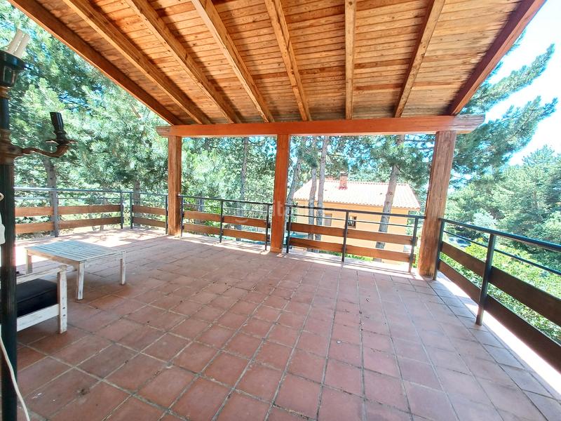 Foto 5b3e8d7d-e0c7-4df2-aaf9-5c26c5153eee. Chalet avec cheminée chauffage dans Mataelpino