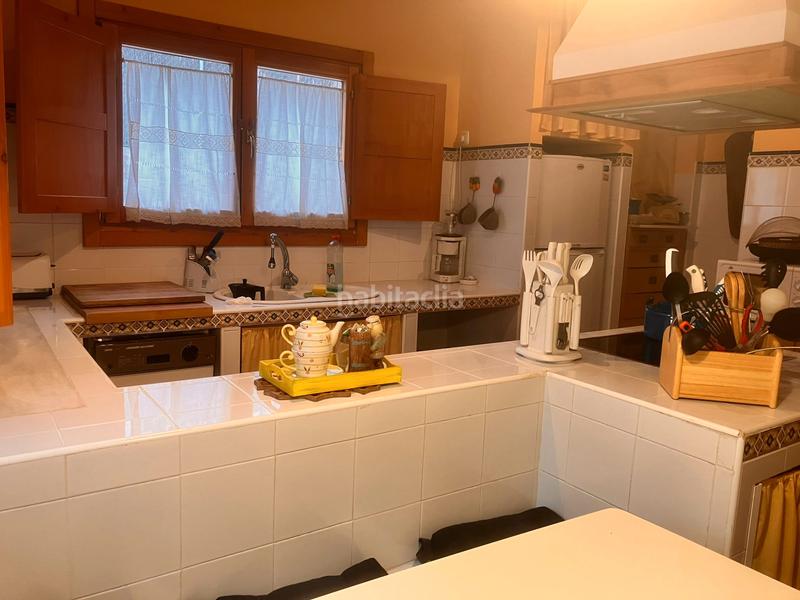 Foto 7568a3a2-08d5-4e7f-97d3-0f09fe6411fc. Chalet avec cheminée chauffage dans Mataelpino