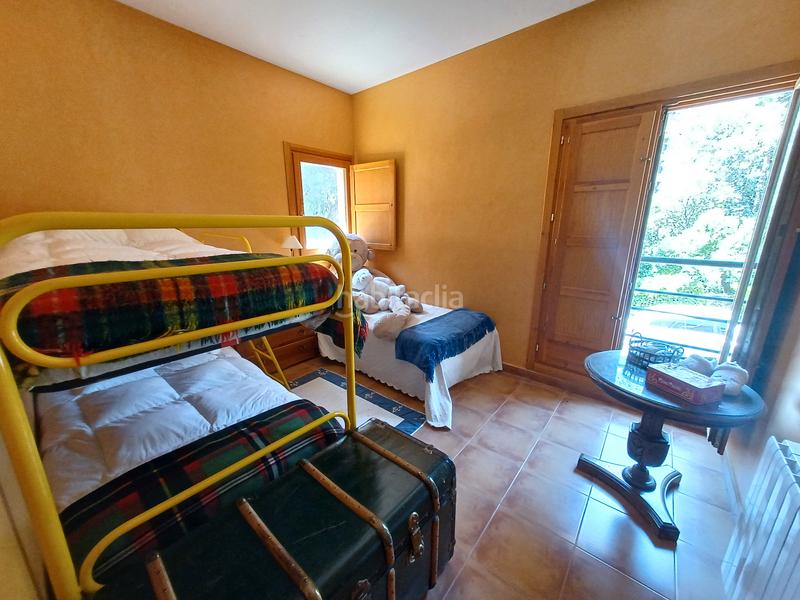 Foto e023843d-c2b7-467f-a8d4-4824c8c581d7. Chalet avec cheminée chauffage dans Mataelpino