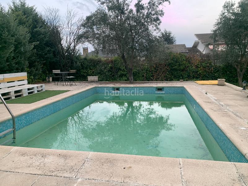 Foto 512f29de-5804-4af3-b73a-22f2f09715ba. Chalet avec cheminée chauffage parking piscine dans Valdemorillo