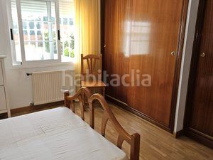 Foto 91dbf7eb-c313-4a73-a072-c9f705996a7d. Casa aparellada amb calefacció aparcament piscina a Coslada