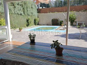 Foto c5b1444c-5886-4b19-8813-bfa11dde1adc. Casa aparellada amb calefacció aparcament piscina a Coslada