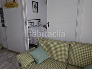 Foto c5c0e9f4-b3bb-4fd0-9fb0-025d266fcb7e. Casa aparellada amb calefacció aparcament piscina a Coslada