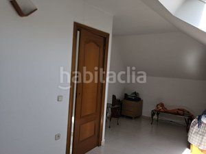 Foto c8d8ab5e-183f-422c-bc68-f67cf275369c. Casa aparellada amb calefacció aparcament piscina a Coslada