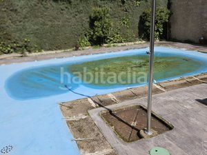 Foto ea7b6328-72f5-4e59-a5e7-4bbdedea38ec. Casa aparellada amb calefacció aparcament piscina a Coslada