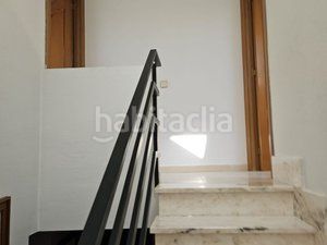 Foto f0a12fc9-b0e3-4c65-8933-7f2784ca831c. Casa aparellada amb calefacció aparcament piscina a Coslada