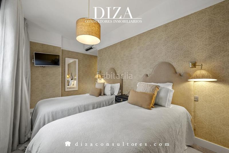 Foto d0fc2dae-e1f1-4a4a-806d-fd7c23a37224. Dúplex ático dúplex con plaza de garaje en el centro en Madrid