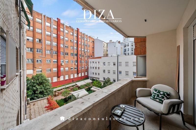 Foto 43626e19-c654-4b42-8eab-1e2fcdc41f9d. Piso reforma, terraza y garaje en almagro en Trafalgar Madrid