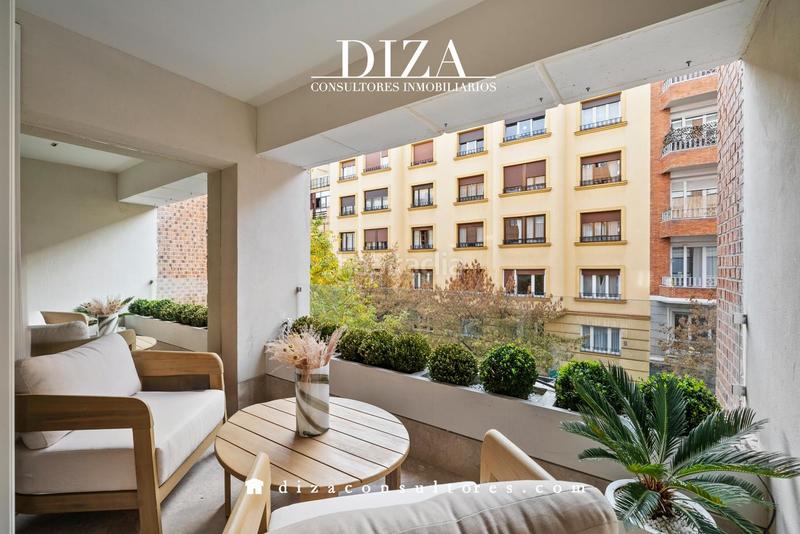Foto d0db8763-ff0f-4f16-887d-ecc114e11c71. Piso reforma, terraza y garaje en almagro en Trafalgar Madrid