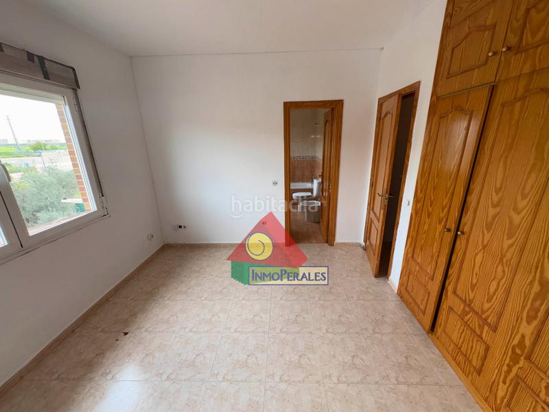 Foto 01a0055c-04fb-4c50-afc6-b83948cd4426. Casa adossada amb calefacció aparcament a Los Robles Seseña
