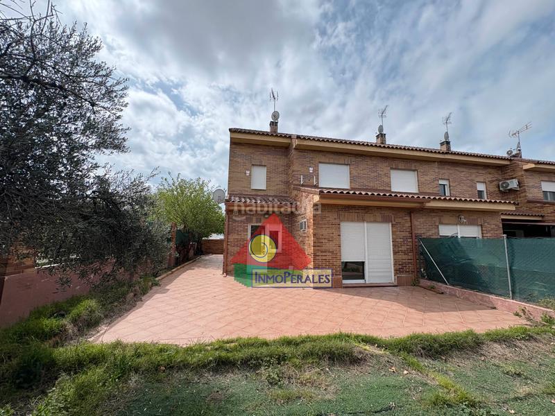 Foto cb32fa2c-f1b1-4d53-84bd-3a0b253fe7d4. Casa adossada amb calefacció aparcament a Los Robles Seseña