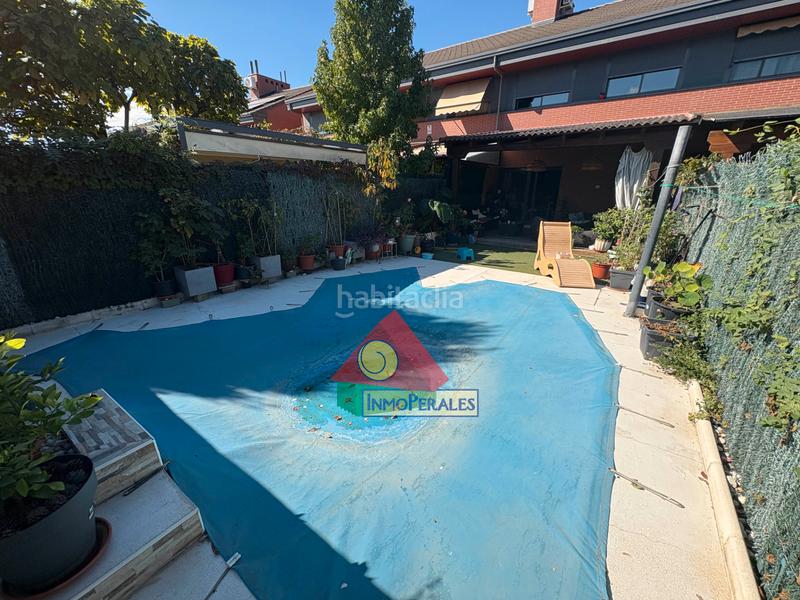 Foto f6cc94ef-efc0-4c14-879d-5f819b16b3df. Xalet amb xemeneia calefacció aparcament piscina a Getafe